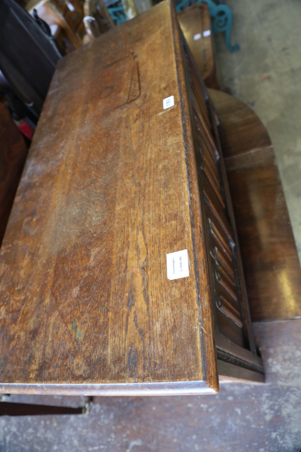 A reproduction oak linenfold coffer, width 104cm depth 45cm height 51cm